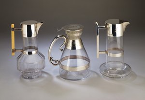 Silver mounted claret jug; electroplate mounted claret jug with aesthetic style decoration to mounts; silver mounted claret jug, all manufactured by Hukin & Heath by Christopher Dresser