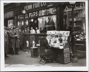 Blind news dealer, Fannie Lyons, at her stand at the south east corner of 7th Avenue & 34th Street by Company Byron