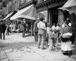 Giving out free ice in Mulberry Street, New York, c.1900
