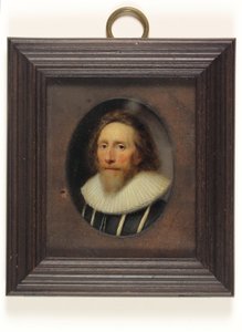 A gentleman in slashed black doublet