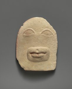 Limestone votive relief of eyes and a mouth (limestone)