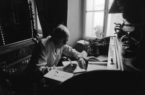 Jiri Mucha Sitting at His Desk in His House in Hradcany, Prague