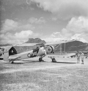Fairey Swordfish I torpedo bomber reconnaissance biplane aircraft K8386, code 945, of 824 Squadron Fleet Air Arm, on Kai Tak airfield, Hong Kong