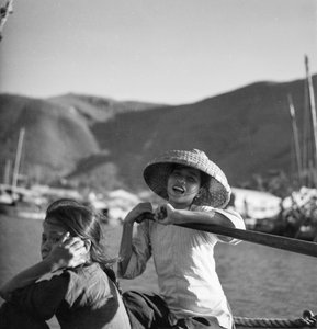 Two young sampan girls at Aberdeen, Hong Kong