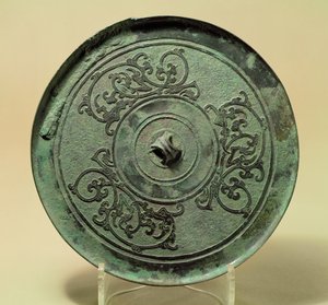 Mirror with Interlacing Dragons, Eastern Zhou Dynasty, Warring States period, 475-221 BC by Eastern Zhou Dynasty Chinese School