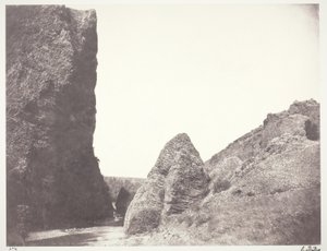 Stream Flowing Between a Cliff and Rocks by Edouard Denis Baldus