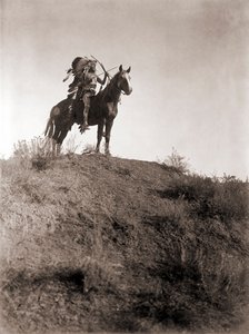Absaroke Warrior on Horseback by Edward Sheriff Curtis