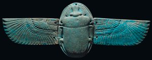 An Egyptian faience winged scarab, c. 664-30 B.C