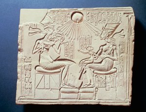 Relief depicting King Amenhotep IV (Akhenaten), his wife Nefertiti and their children under rays of sun god Aton