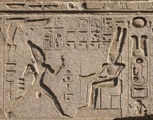 Egyptian Antiquity: Detail of the Architrave Decorates the Representation of Pharaoh Ramses II Honoring the God Amon and Hieroglyphs, Temple of Pharaoh Ramses II in Luxor, East Bank (Thebes), Egypt