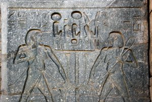 Egyptian Antiquity: Detail of the Base of the Statue of Pharaoh Ramses II Representing the Union of Upper and Lower Egypt. Temple of Luxor, East Bank (Thebes), Egypt by Egyptian 19th Dynasty