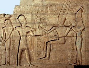 Egyptian Antiquity: Relief Depicting Pharaoh Ramses II in Front of Two of the Deities of the Theban Triad, Amon and Mut; Funeral Temple Dedicated to Pharaoh Ramses II, Site of Ramesseum in Luxor, Egypt