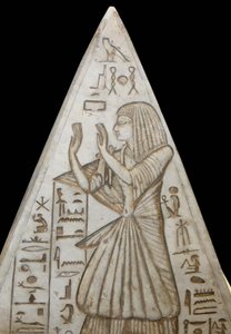Pyramidion in limestone poses at the top of the chapel tombs in the pyramids