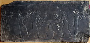 Limestone plate decorated with low relief representing the pressing of lotus flowers, 8th to 7th century BC (relief) by Egyptian School