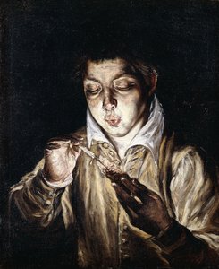 A Boy Lighting a Candle