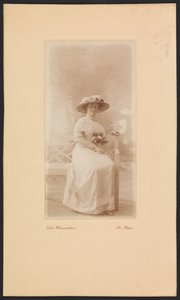 Portrait of Mrs. M.C. Lucassen-Van Idsinga with Hat and Dress Sitting on a Bench by Else Weissenborn