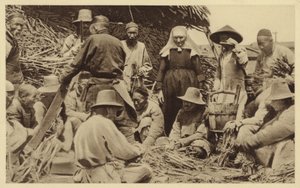 A Missionary Standing Among Villagers in China by English Photographer