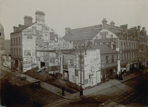 Advertising on houses, London by English Photographer