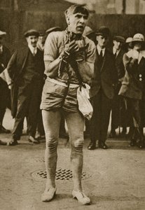 An actor dressed up as Houdini outside a theatre pit-door by English Photographer