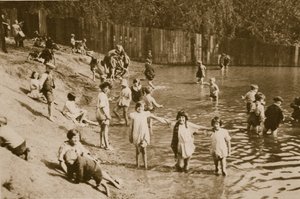 Children playing in Hampstead pond