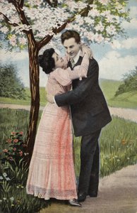 Couple Embracing Under a Blossom Tree by English Photographer