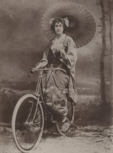 Girl on bicycle, dressed in the Japanese fashion