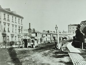 Kilburn Toll Gate at south end of Kilburn High Road by junction of Kilburn Priory, Camden Libraries by English Photographer