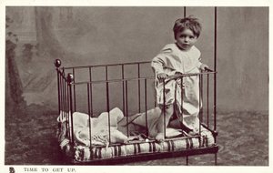 Little boy in a crib