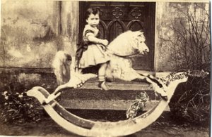 Little Girl on a Large Rocking Horse in a Garden, 1860s