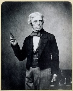 Michael Faraday holding a Bar Magnet by English Photographer