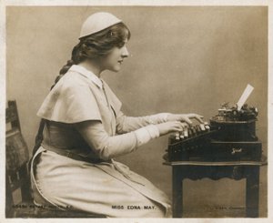 Miss Edna May, at typewriter