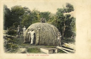 Native hut under construction by English Photographer