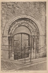 Norman doorway of St Nicholas Church, New Romney, Kent by English Photographer