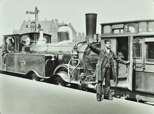Platform Porter at a Railway Station, 1885 by English Photographer