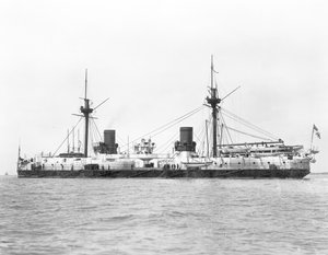 View of the ironclad battleship HMS Inflexible (launched 1876) pictured after conversion to military rig in 1885 by English Photographer