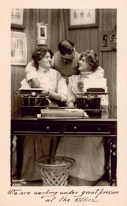 We are working under great pressure at the office by English Photographer