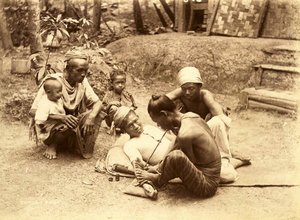 A Shan man being Tattooed, 1890