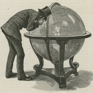 A Man from Lloyds Studying a Globe