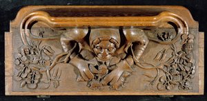 A misericord depicting an ogre with enormous shoulders, New College Chapel, Oxford, late 14th century by English School