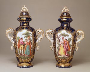 A pair of Chelsea blue-ground lobed tapering oviform vases and covers depicting lovers among trees, c.1765