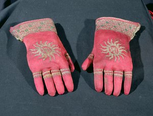 A pair of knitted silk gloves, possibly once belonging to Archbishop William Warham, late 15th or early 16th century by English School