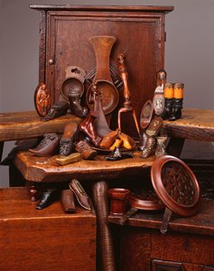 A selection of 19th century wooden strainers, shoe snuffs and other objects by English School