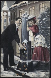 A well-dressed couple laughing