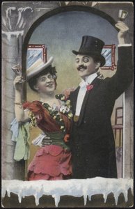 A well-dressed couple laughing by English School