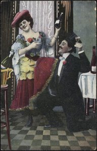 A well-dressed couple laughing by English School