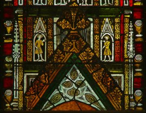 A window in the Lady Chapel depicting canopy figures by English School
