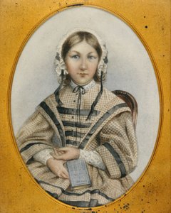 A young Florence Nightingale in an oval frame by English School