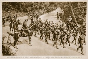 Anglo Saxon Brotherhood in Arms: American Troops Led by a British Band Marching Past a British General in France by English School