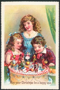 Children looking at Christmas Cake