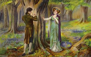 Couple scratching a heart onto a tree